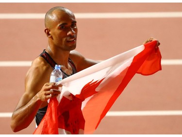 Canada's Damian Warner celebrates winning bronze at the World Athletics Championships in Doha, Qatar, on Wednesday.