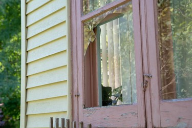 A window on Bess Srahulek's house on Broughdale Avenue was smashed during last weekend's FoCo. A group of Western University students has set up a GoFundMe campaign to cover the cost of repairs. (Max Martin, The London Free Press)