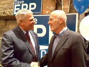 Conservative Dave Epp is greeted by retiring Conservative MP Dave Van Kesteren on Monday after he took the lead in the Chatham-Kent-Leamington riding to keep the seat Tory blue. (Trevor Terfloth/Chatham Daily News)