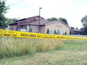 Police tape cordons off the crime scene near the Walpole Island water treatment plant, where the body of Clifford Lincoln Riley, 50, was discovered June 22, 2012.