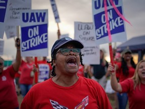 GM team leader Natalie Walker, 56, leads chants as General Motors assembly workers and their supporters gather to picket outside the General Motors Bowling Green plant during the United Auto Workers (UAW) national strike in Bowling Green, Kentucky, U.S., September 20, 2019.