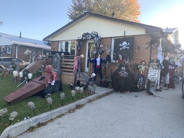 The Halloween House can be found at 335 Admiral Dr. A driveway walk-in tent will be open the week of Halloween, so check it out! (Photo by Jane Barran)