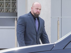London police constable Wesley Reeve is picked up outside the London Police station after his internal discipline hearing in London, Ont. on Wednesday September 25, 2019. (Derek Ruttan/The London Free Press)