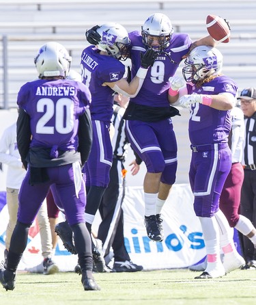 Western Mustang Myles Manalo celebrates his first quarter interception against the Ottawa Gee Gees in London, Ont. on Saturday October 19, 2019. Derek Ruttan/The London Free Press/Postmedia Network