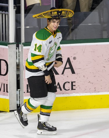 Luke Evangelista sports a traditional hat trick sombrero after being named first star of the  game against the Kingston Frontenacs  in London, Ont. on Saturday October 19, 2019. Evangelista scored three times and assisted on another goal in the 6-3 victory.Derek Ruttan/The London Free Press/Postmedia Network