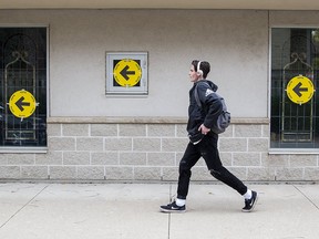Patryck Hoover walks into a polling station at Christ Community Church in to cast first ever vote in a federal election in  London, Ont. on Monday October 21, 2019. (Derek Ruttan/The London Free Press)