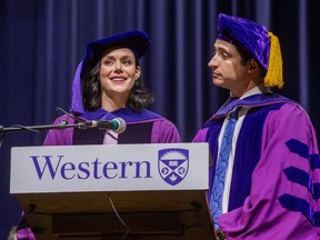 Tessa Virtue and Scott Moir gave the convocation address at Western University graduation ceremony in London, Ont. on Wednesday. The two time Olympic champion and three time world champion ice dancers received honorary doctorates from the school.  (Derek Ruttan/The London Free Press)