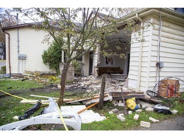 A car crashed into this house a 45 Blackfriars St. after tearing open a wall of the Society Cafe at the corner  Blackfriars Street and Wilson Avenue in London, Ont. on Sunday Oct. 27, 2019. (Derek Ruttan/The London Free Press)