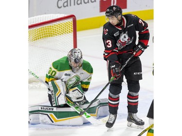 Niagara Ice Dog forward Jake Uberti looks for a rebound in front of London Knights goalie Brett Brochu  during the third period of their OHL hockey game at Budweiser Gardens on Sunday Oct. 27, 2019. Derek Ruttan/The London Free Press