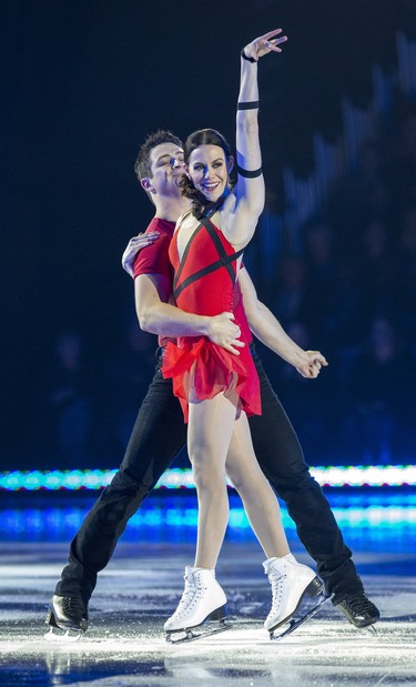 Scott Moir and Tessa Virtue perform during Rock The Rink in London, Ont. on Wednesday, Oct. 30, 2019. (Derek Ruttan/The London Free Press)