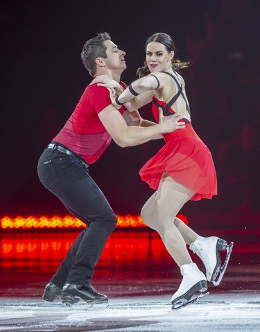 Scott Moir and Tessa Virtue perform during Rock The Rink in London, Ont. on Wednesday, Oct. 30, 2019. (Derek Ruttan/The London Free Press)