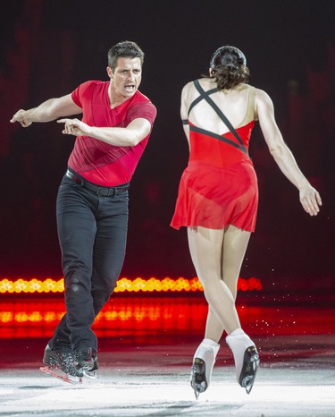 Scott Moir and Tessa Virtue perform during Rock The Rink in London, Ont. on Wednesday, Oct. 30, 2019. (Derek Ruttan/The London Free Press)