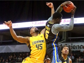Marvin Phillips of the Lightning comes up empty as he goes up for an offensive rebound against Marvin Binney of the Saint John Riptide during their game on Sunday, January 13, 2019 at Budweiser Gardens in London.  (Mike Hensen/The London Free Press)
