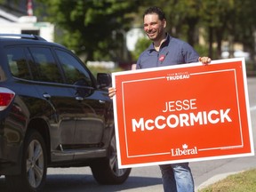 Jesse McCormick, Lambton-Kent-Middlesex Liberal candidate shows his colours on the Main Street in Mt. Brydges near his campaign office.  Photograph taken on Tuesday October 1, 2019.  (Mike Hensen/The London Free Press)