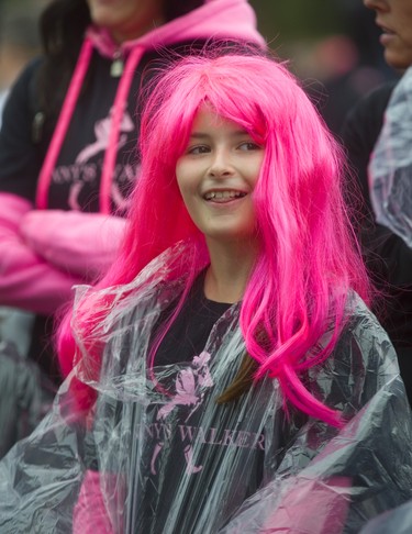 Makayla Geoffrey, 11 donned a pink wig to walk for Uncle John, John Digou who had breast cancer. Less than 1% of breast cancer patients are male, and they are rarely tested said family members at the 25th annual Run for the Cure at Victoria Park on Sunday October 6, 2019. 
Mike Hensen/The London Free Press/Postmedia Network
