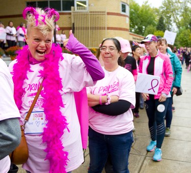 Cara Reid, a breast cancer survivor celebrates with family as she walks up on stage with other survivors at the 25th annual Run for the Cure on Sunday October 6, 2019. 
Mike Hensen/The London Free Press/Postmedia Network