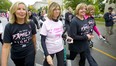 Nancy Douglas, second from left, recently was diagnosed with breast cancer. She is joined on the 25th annual Run for the Cure on Sunday Oct. 6, 2019, by her sisters Lorraine, left, Marilyn and Mary Ann, wearing T-shirts that read, "In this family, no one fights alone." (Mike Hensen/The London Free Press)