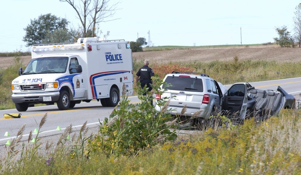 A woman was killed in a collision between and SUV and a sedan on Highbury Avenue just north of Scotland Drive in London. (Derek Ruttan/The London Free Press)