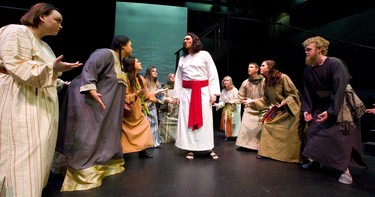 Jesus Christ performed by Braven Warren is surrounded by his supporters during the song What's the Buzz in Jesus Christ Superstar which is being presented by Pacheco Theatre at the McManus stage at the Grand Theatre running Oct. 10-19, 2019.  Photograph taken on Tuesday October 8, 2019.  Mike Hensen/The London Free Press/Postmedia Network