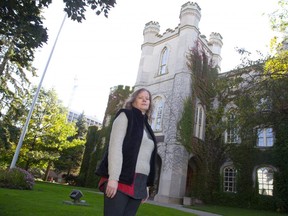 Jenny Grainger, president of the London branch of the Architectural Conservancy of Ontario, in front to the former courthouse that was built in 1830 in London. Derek Ruttan/The London Free Press