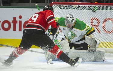 Owen Sound's Barret Kirwin breaks in alone on Knights goaltender Brett Brochu early in the first period of their OHL game Friday October 11, 2019 at Budweiser Gardens.  Brochu made the stop but Ethan Burroughs potted the followup scoring the first goal of the game, Brochu was pulled when the score went to 3-0 halfway through the first. Mike Hensen/The London Free Press/Postmedia Network