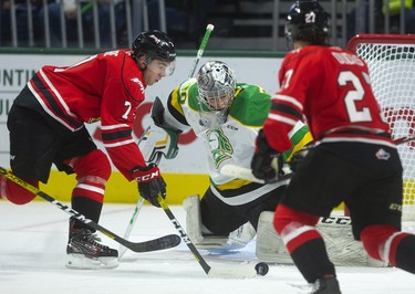 Owen Sound's Denitrify Goure breaks through the crease and scores their third goal of the first period chasing Knights goaltender Brett Brochu out in the first period of their OHL game Friday October 11, 2019 at Budweiser Gardens.  Mike Hensen/The London Free Press/Postmedia Network