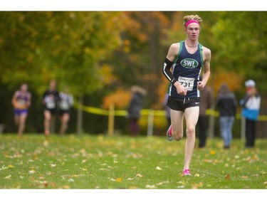 Laurier's Mathew Mason leaves the rest behind early in the senior boys' TVRA cross-country final at Springbank Park on Thursday Oct. 17, 2019. Mason led throughout to win alone.  Mike Hensen/The London Free Press