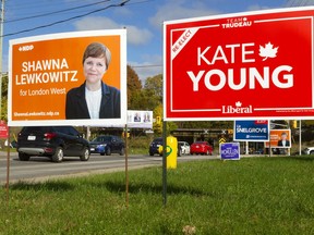 Federal election campaign signs cluster along Wharncliffe Road in the riding of London West on Friday. (Mike Hensen/The London Free Press)