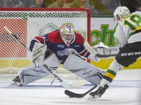 Liam Foudy of the London Knights gets a quick shorthanded breakaway on Saginaw Spirit goaltender Tristan Lennox during the first period of their game on Oct. 25, 2019 at Budweiser Gardens in London. (Mike Hensen/The London Free Press)