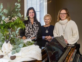 Christmas home tour for the Rotary Club Tour of Homes east of St. Thomas, at the home of Jim & Carol Wiebe. From left, decorator Jaclyn McClenaghan of Berry Hill, Patricia Martyn of there Rotary Club Tour of Homes, and home owner Carroll Wiebe. Mike Hensen/The London Free Press/Postmedia Network