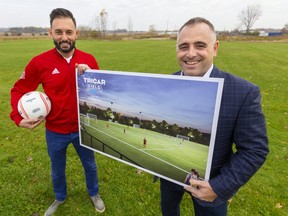 Dave DeBenedictis, general manager of London TFC, and Adam Carapella, vice-president of operations for Tricar Group, show off the new site behind the developer's head office on Colonel Talbot Road that will be the new site of TRICAR Field, and the home of the London TFC Academy. (Mike Hensen/The London Free Press)