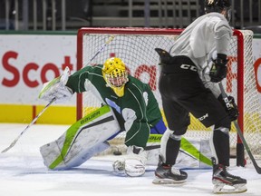 New London Knights goaltender Dylan Myskiw tries to get over to cover the post against forward Matvey Guskov crosses in front of the net during Myskiw's first day of practice at Budweiser Gardens in London, Ont.  Mike Hensen/The London Free Press