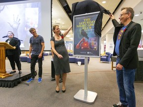 London city councillors Elizabeth Peloza and Shawn Lewis unveil The Saturday Night Ghost Club as the One Book One London selection with Sarah Andrews, the co-chair, and author Craig Davidson in the Central library on Wednesday October 30, 2019.  Mike Hensen/The London Free Press