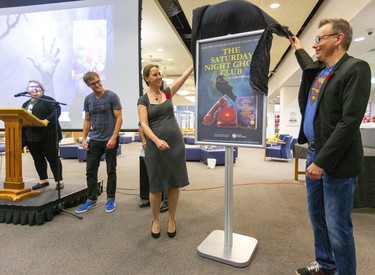 London city councillors Elizabeth Peloza and Shawn Lewis unveil The Saturday Night Ghost Club as the One Book One London selection with Sarah Andrews, the co-chair, and author Craig Davidson in the Central library on Wednesday October 30, 2019.  Mike Hensen/The London Free Press