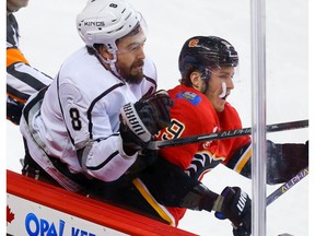 Calgary Flames forward Matthew Tkachuk collides with Drew Doughty of the Los Angeles Kings during NHL hockey in Calgary on Tuesday October 8, 2019. Al Charest / Postmedia