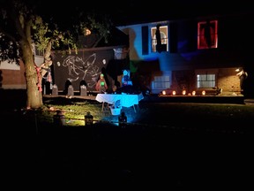 Londoner John Catunto is proud of his Halloween display this year on Blue Forest Drive. (Photo by Lisa Catunto)