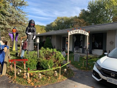 This house on Queen Anne Circle has been doing a front yard display for years. There are animated props throughout the yard that are self-activated as you walk through. At night, there are smoke machines, strobe lights, movie projections on the windows, and the garage is a full projection screen. 
(Photo by Brigham Whitehead)