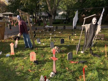 This house on Queen Anne Circle has been doing a front yard display for years. There are animated props throughout the yard that are self-activated as you walk through. At night, there are smoke machines, strobe lights, movie projections on the windows, and the garage is a full projection screen. 
(Photo by Brigham Whitehead)