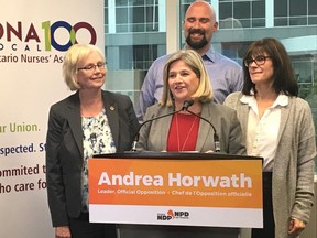 Provincial NDP Leader Andrea Horwath is flanked by London NDP MPPs Peggy Sattler, Terence Kernaghan and Teresa Armstrong while visiting the Forest City on Wednesday Oct. 16, 2019. (Heather Rivers/The London Free Press)
