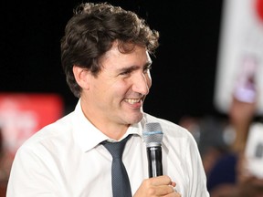 Liberal Leader Justin Trudeau speaks to supporters during a rally held late Saturday evening at the Magnolia Banquet Hall during the last days of the federal election campaign. Saturday, October 19, 2019. Brendan Miller/Postmedia