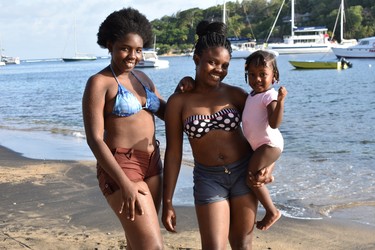 Elaina, 2, with mom Youleen and sister Venisha pose for a photo while enjoying St. Vincent's villa beach. The local "Vincys" recommend trying callaloo soup, a Caribbean concoction of steamed fish and vegetables. When asked to name the country's top tourist attractions, "friendly people" and "beautiful sunsets" were at the top of the list.

St. Vincent and the Grenadines 2019
BARBARA TAYLOR THE LONDON FREE PRESS/POSTMEDIA NEWS