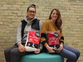 Allison DeBlaire and Amber Irvine, the founders of 519Pursuit - a grassroots agency that builds relationships with London's homeless to offer friendship and support - are hoping to collect 519 pledges of 519 pairs of socks as part of a six-week campaign that wraps up next week. (MEGAN STACEY/The London Free Press)