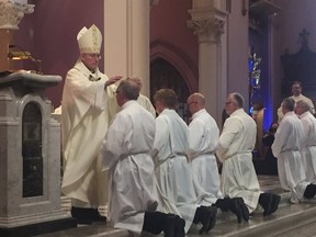 Ronald Fabbro, bishop of the London Catholic diocese, ordained seven new deacons on Saturday, which brings their ranks to 81 across Southwestern Ontario. (Heather Rivers/The London Free Press)