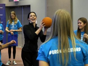 Tessa Virtue, centre, participates in an activity in Woodstock on Thursday at Calvary Church for the second GROWgirls event. About 600 Grade 9 female students from all Oxford County high schools took part in several activities aimed at emplowment. (Greg Colgan/Postmedia Network)