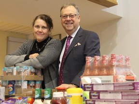 Jane Roy, co-executive director of the London Food Bank, and Wayne Dunn, campaign chair of the Business Cares Food Drive, were Friday at Western University for the official launch of the annual drive, now in its 20th year. JONATHAN JUHA/The London Free Press