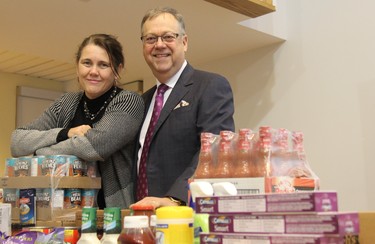 Jane Roy, co-executive director of the London Food Bank, and Wayne Dunn, campaign chair of the Business Cares Food Drive, were Friday at Western University for the official launch of the annual drive, now in its 20th year. JONATHAN JUHA/The London Free Press