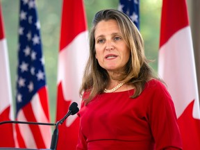 The new intergovernmental affairs minister, Chrystia Freeland, will need to turn her negotiating skills from the new NAFTA to Canada's internal discontents. (AFP file photo_