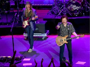 Patrick Simmons and Tom Johnston of The Doobie Brothers Perform Toulouse Street And The Captain and Me Albums Live at The Ryman  on November 18, 2019 in Nashville, Tennessee.