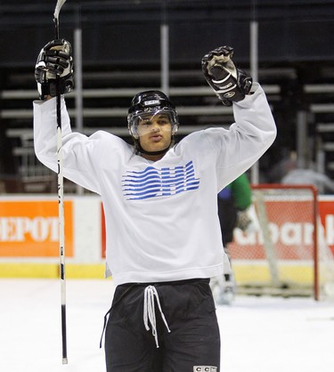 Forward Akim Aliu celebrates his team’s victory over in a London Knights scrimmage at practice yesterday at the John Labatt Centre.