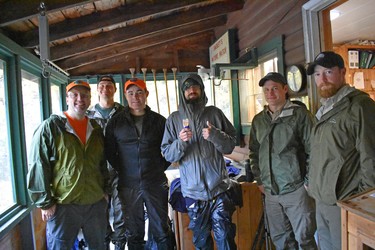 Hiker Ian Newton shows a sign of gratitude to Baxter State Park's search and rescue team including park director Eben Sypitkowski, second from right, after they responded to his request for help on Mount Katahdin the night before. 
IAN NEWTON/ Special to Postmedia News
Appalachian Trail 2019